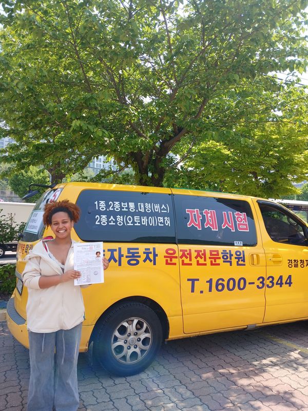 Foreign student at the SDA Anyang campus after completing the Korean licence course
