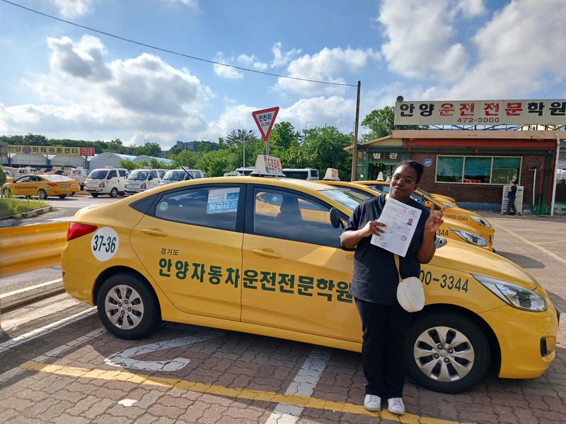 Foreign student at the SDA Anyang campus after completing the Korean licence course