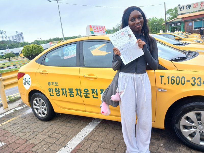 SDA English-programme graduate after passing the Korean road driving test