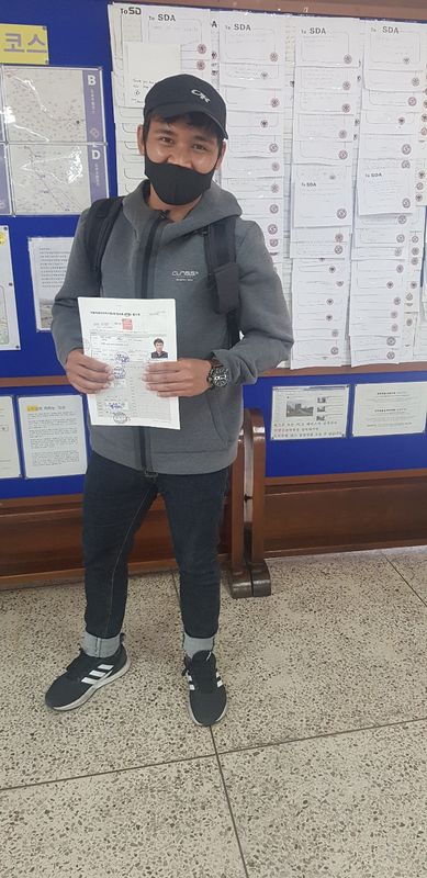 Foreign student at the SDA Anyang campus after completing the Korean licence course